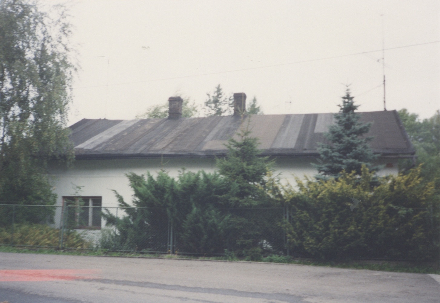Dům čp. 869 (Řeznictví Folwarczny) na fotografii z roku 1999