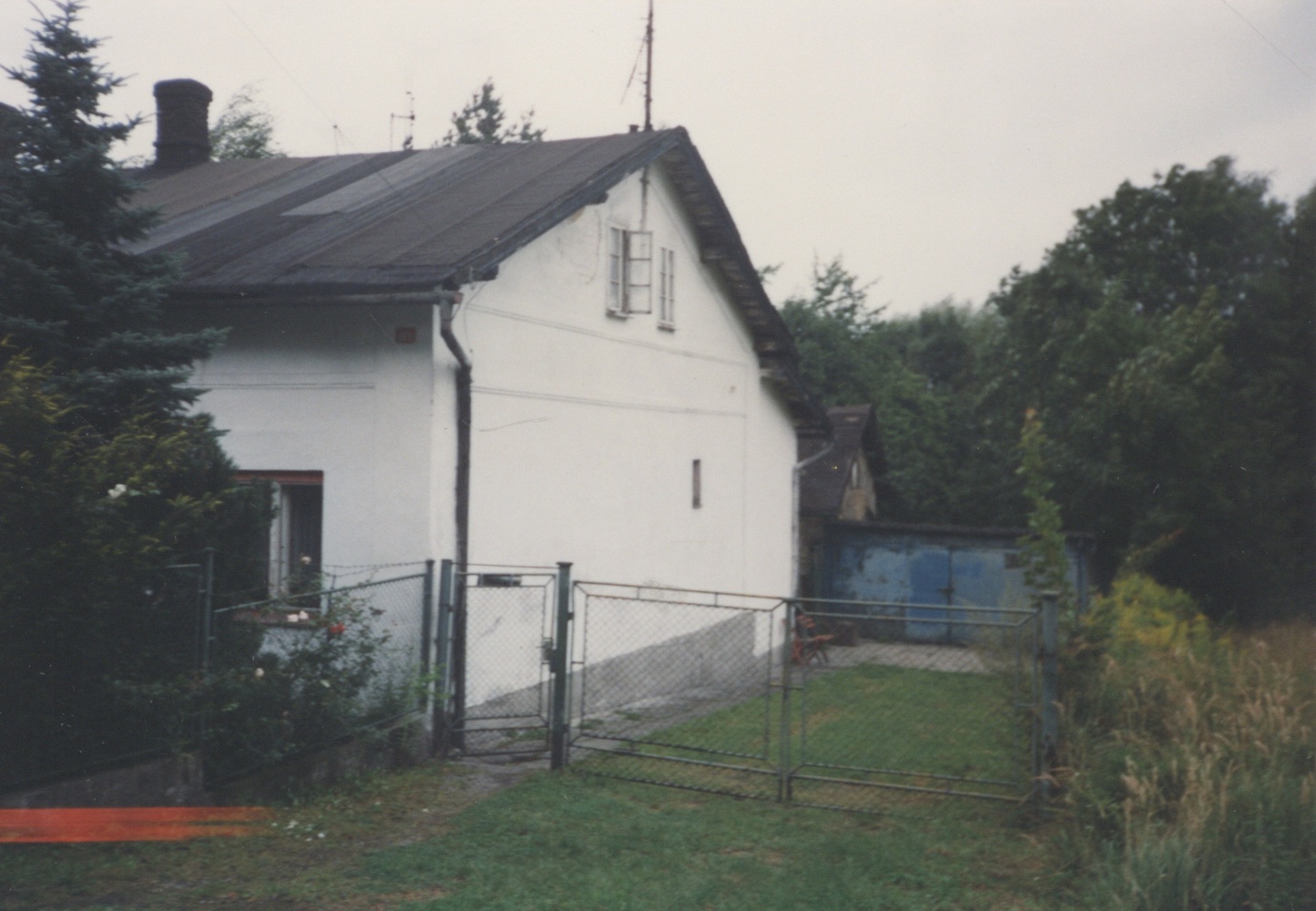 Dům čp. 869 (Řeznictví Folwarczny) na fotografii z roku 1999
