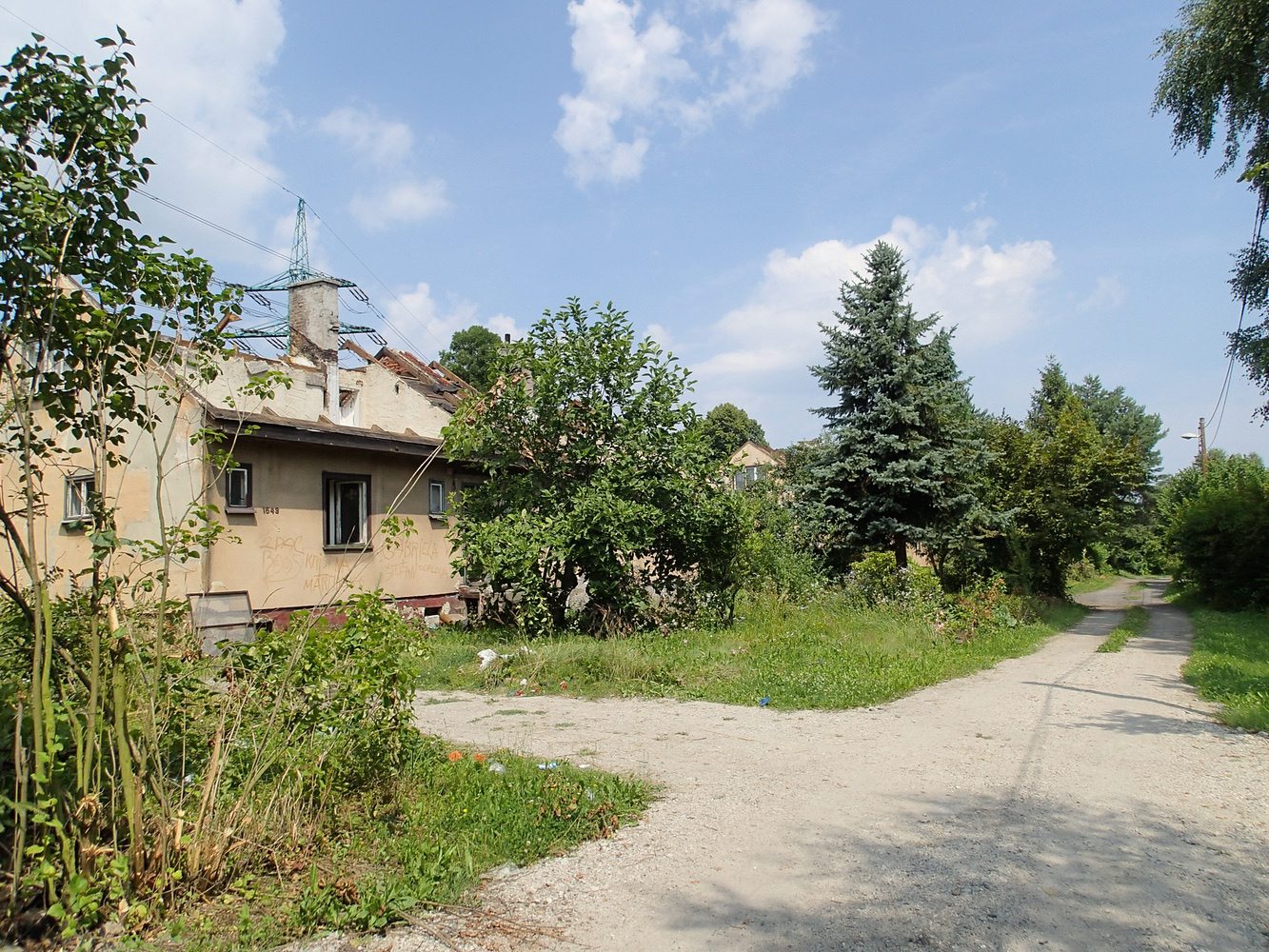 Dům čp. 1542, 1543 na ulici Partyzánská v červenci 2014 (foto: Jiří Dvořák)