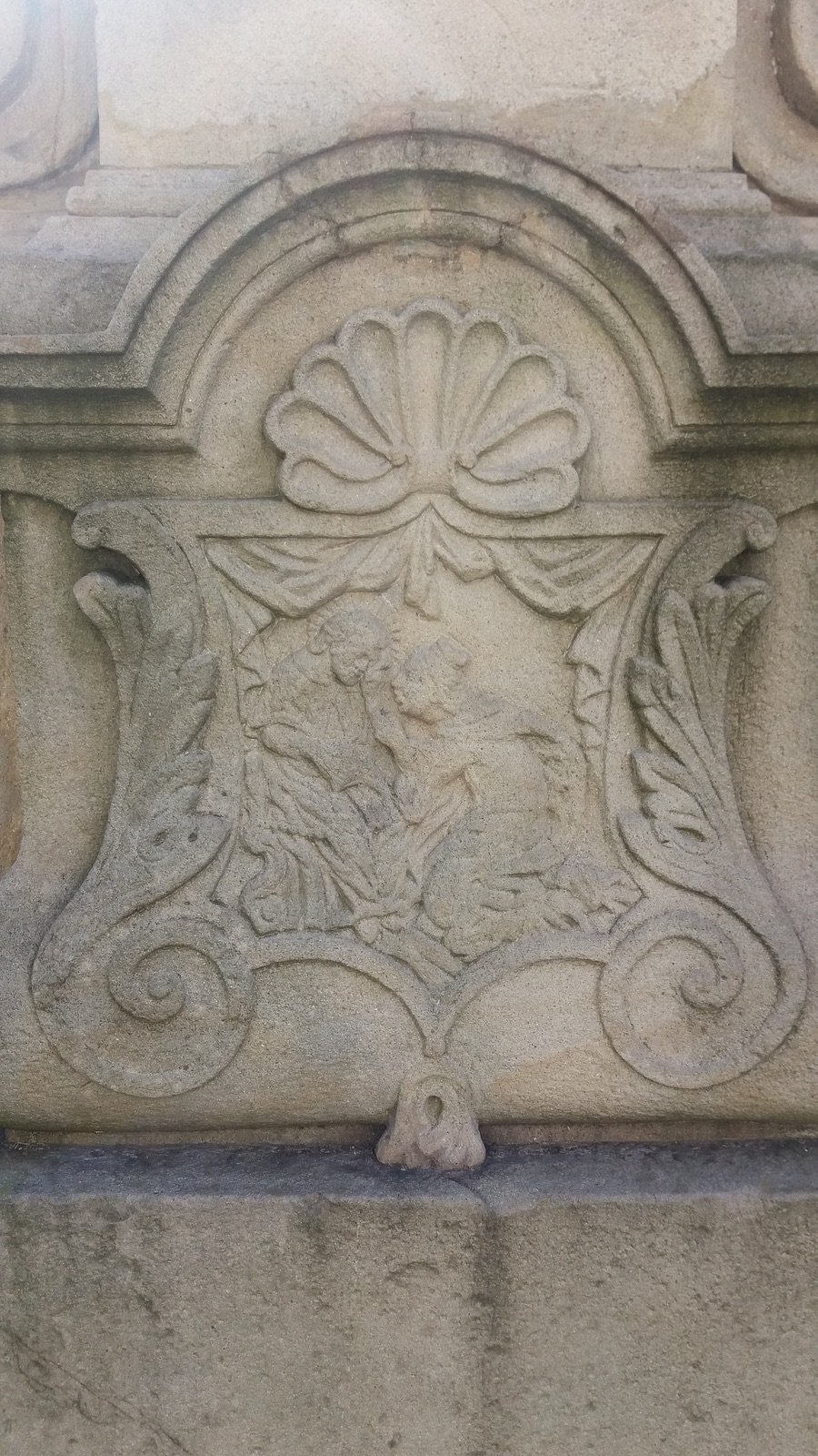 Barokní socha svatého Jana Nepomuckého z roku 1747 za presbytářem kostela Povýšení sv. Kříže ve Fryštátě. Původně stála socha na náměstí, přibližně v místech před dnešním pomníkem T. G. Masaryka.